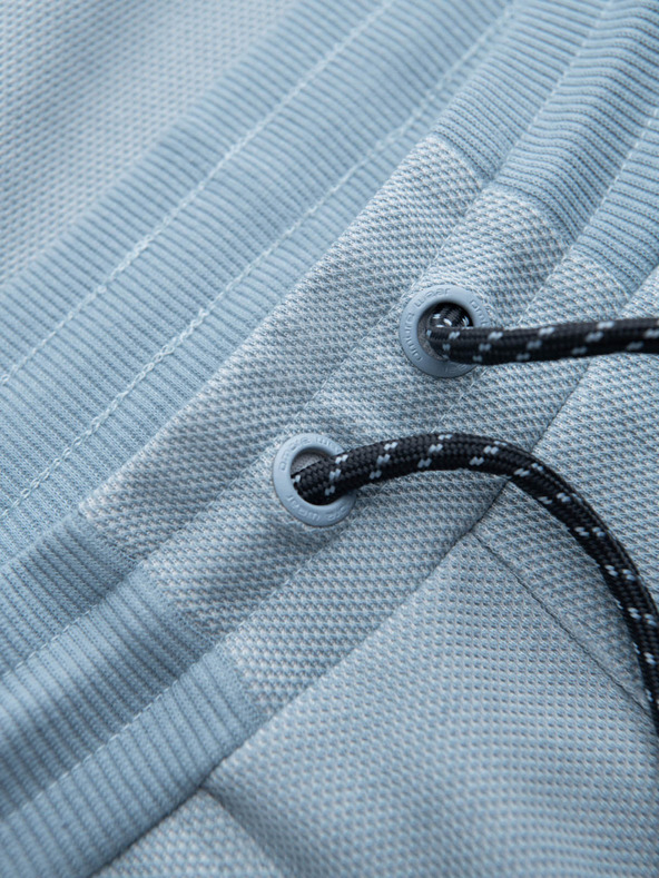 Ombre Clothing Svetlomodré pánske tepláky Ombre oblečenie