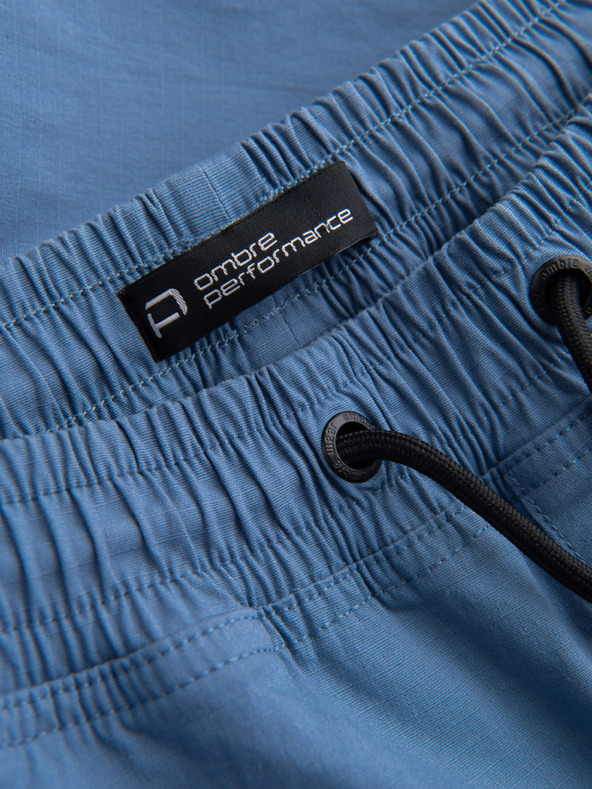 Ombre Clothing Modré pánske nohavice cargo jogger Ombre Oblečenie