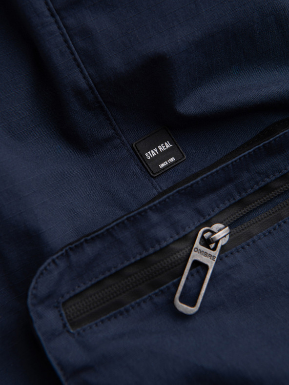 Ombre Clothing Tmavomodré pánske nohavice cargo jogger Ombre Clothing