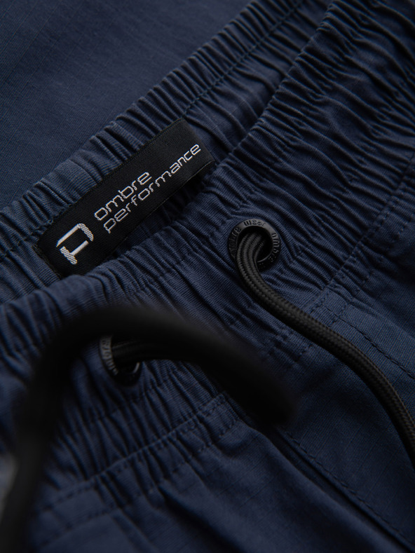 Ombre Clothing Tmavomodré pánske nohavice cargo jogger Ombre Clothing