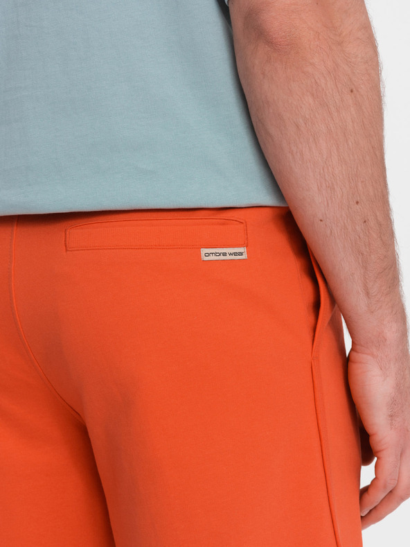 Ombre Clothing Oranžové pánske tepláky Ombre Oblečenie