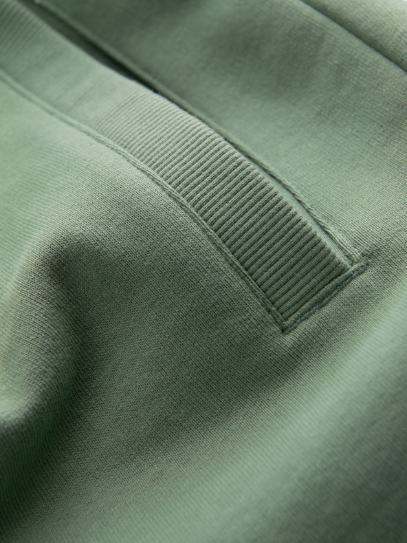 Ombre Clothing Zelené pánske tepláky Ombre Oblečenie