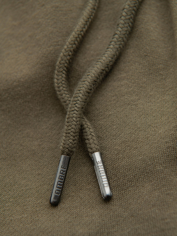 Ombre Clothing Tmavozelené pánske tepláky Ombre Oblečenie