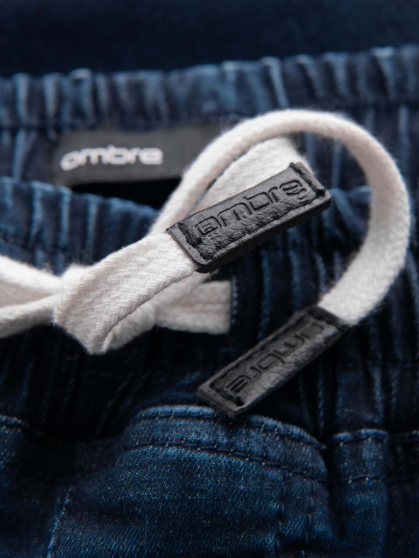 Ombre Clothing Pánske džínsové tepláky s lemovaním - tmavomodré V4 OM-PADJ-0156 Ombre Clothing