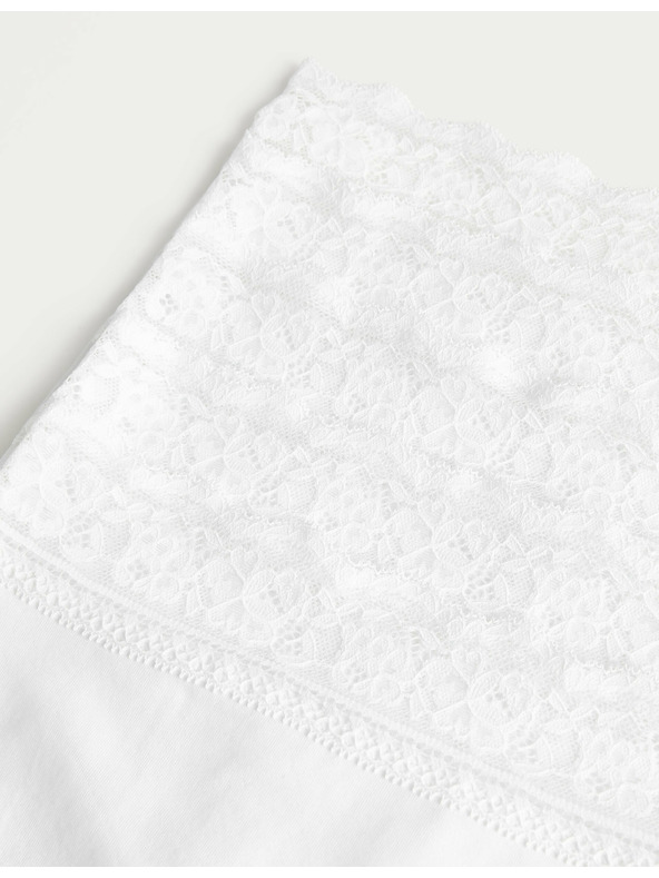 Marks & Spencer Súprava piatich dámskych chinos nohavíc s čipkovaným detailom v bielej farbe Marks & Spencer