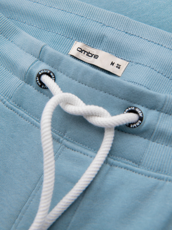 Ombre Clothing Pánske bavlnené tepláky BASIC s nepodšitou nohavicou - svetlé modré V7 OM-PABS-0304 Ombre Clothing