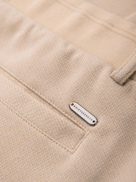 Ombre Clothing Pánske voľnočasové nohavice CARROT FIT zo žakárdového úpletu - béžové V2 OM-PACP-0292 Ombre Clothing