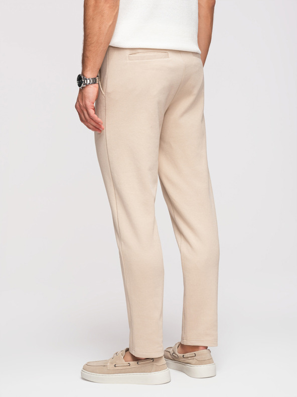 Ombre Clothing Pánske voľnočasové nohavice CARROT FIT zo žakárdového úpletu - béžové V2 OM-PACP-0292 Ombre Clothing