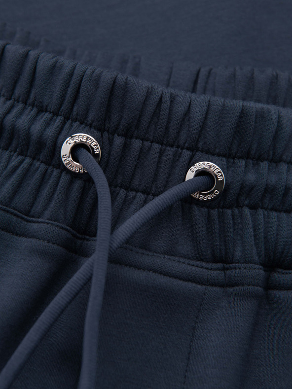 Ombre Clothing Pánske tepláky s rovnými nohavicami z hladkého úpletu - tmavomodré V4 OM-PSBC-0221 Ombre Clothing