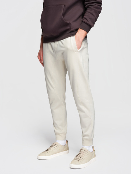 Ombre Clothing Pánske tepláky BASIC so žebrovanou nohavicou - krémové V11 OM-PABS-0305 Ombre Clothing