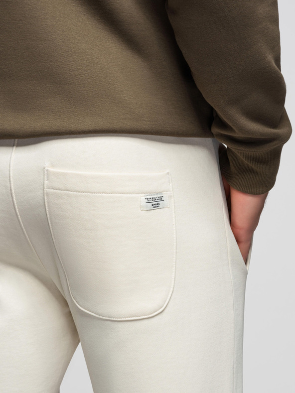 Ombre Clothing Pánske bavlnené tepláky BASIC s nepodšitou nohavicou - krémové V11 OM-PABS-0304 Ombre Clothing