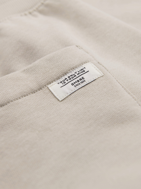 Ombre Clothing Pánske bavlnené tepláky BASIC s nepodšitou nohavicou - svetlé béžové V1 OM-PABS-0304 Ombre Clothing