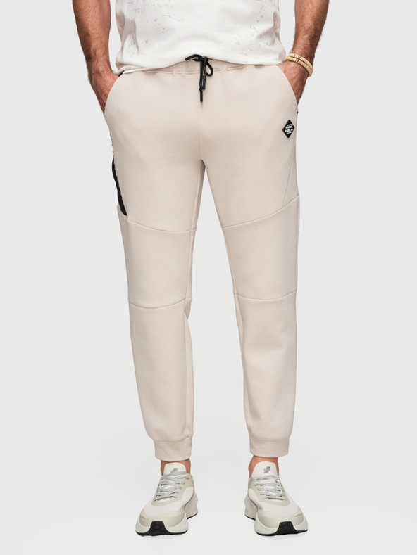 Ombre Clothing Pánske tepláky so žebrovanými manžetami a ozdobným zipsom - pieskovo V6 P1520 Ombre Clothing