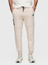 Ombre Clothing Pánske tepláky so žebrovanými manžetami a ozdobným zipsom - pieskovo V6 P1520 Ombre Clothing