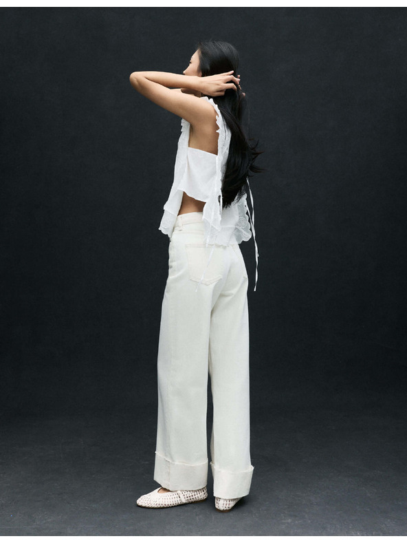Marks & Spencer Ohrnovateľné džínsy so širokými nohavicami a vysokým pásom Marks & Spencer smotanová