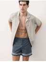 Marks & Spencer Plavecké šortky s výšivkou okrajov Marks & Spencer modrá