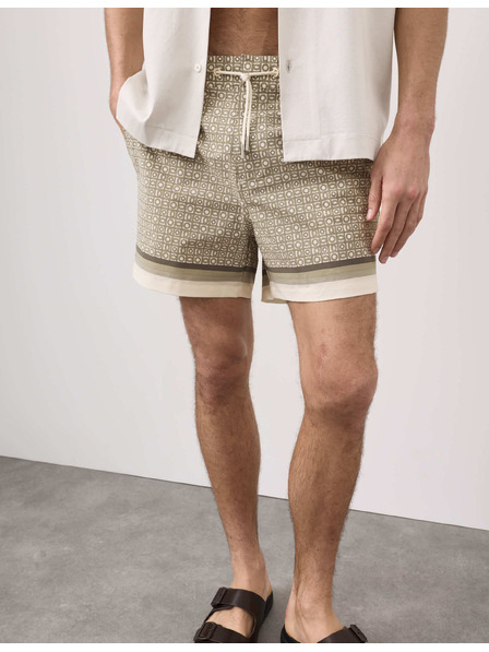 Marks & Spencer Rýchlosušujúce kúpacie šortky s geometrickým potlačou Marks & Spencer zelená