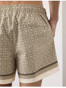 Marks & Spencer Rýchlosušujúce kúpacie šortky s geometrickým potlačou Marks & Spencer zelená
