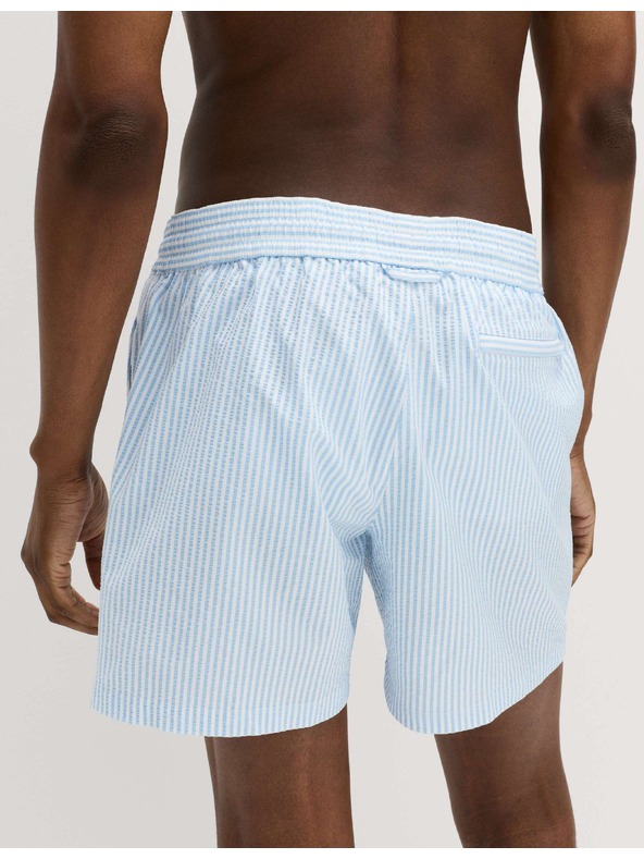 Marks & Spencer Plavecké šortky z mačkaného materiálu Marks & Spencer modrá