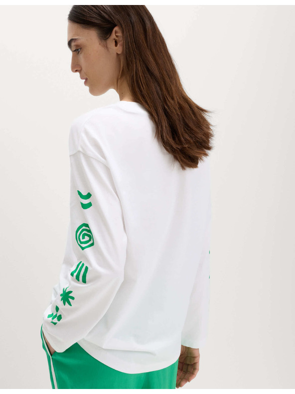Marks & Spencer Oversized tričko s grafikou z čistej bavlny Marks & Spencer biela