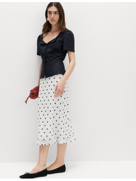 Marks & Spencer Bodkovaná strečová sukňa po kolená Marks & Spencer krémová